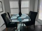 Glass Table and 4 Black Velvet Chairs $500