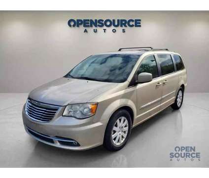 2013 Chrysler Town &amp; Country for sale is a Gold 2013 Chrysler town &amp; country Car for Sale in Mission KS