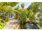 284 46th St NW, Miami, FL 33127