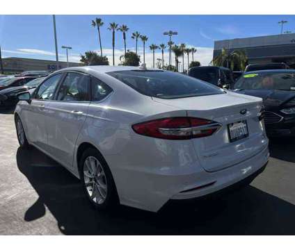 2020UsedFordUsedFusionUsedFWD is a Silver, White 2020 Ford Fusion Car for Sale in Hawthorne CA