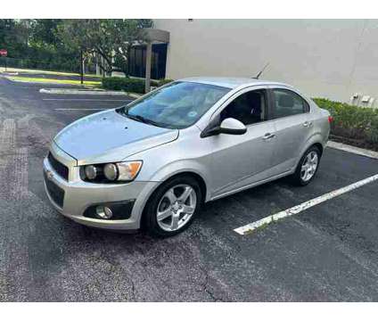 2013 Chevrolet Sonic for sale is a Silver 2013 Chevrolet Sonic Car for Sale in North Lauderdale FL