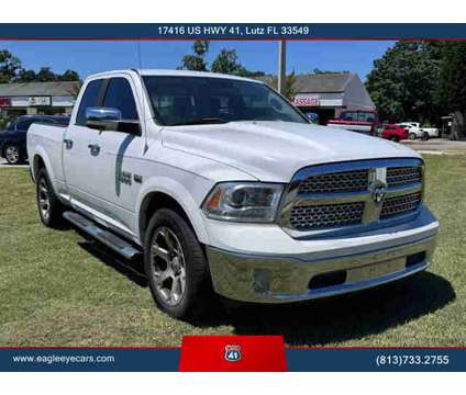 2013 Ram 1500 Quad Cab for sale is a White 2013 RAM 1500 Model Car for Sale in Lutz FL