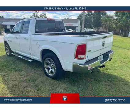 2013 Ram 1500 Quad Cab for sale is a White 2013 RAM 1500 Model Car for Sale in Lutz FL