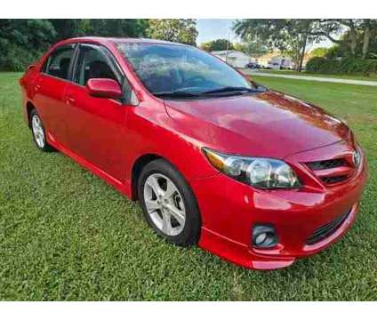 2011 Toyota Corolla for sale is a Red 2011 Toyota Corolla Car for Sale in Orange City FL