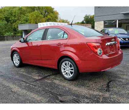 2012 Chevrolet Sonic LT is a Red 2012 Chevrolet Sonic LT Car for Sale in Paw Paw MI