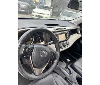2014 Toyota RAV4 for sale is a Silver 2014 Toyota RAV4 4dr Car for Sale in Houston TX