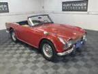 1965 Triumph TR4 1965 TRIUMPH TR4 CONVERTIBLE. SIGNAL RED WITH BLACK TRIM 1965