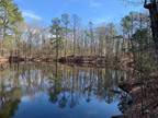 Sumter, 15.8 acres total of two parcels with a pond on N.