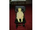 Old antique doll with buggy stroller