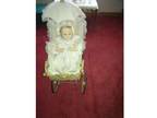 Antique victorian wicker baby doll with buggy