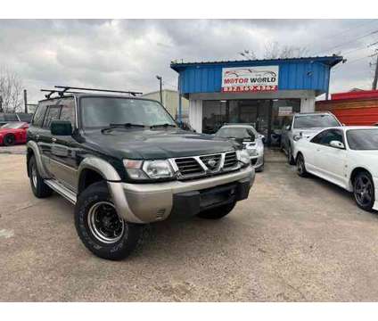 1998 Nissan Safari for sale is a Green 1998 Car for Sale in Houston TX