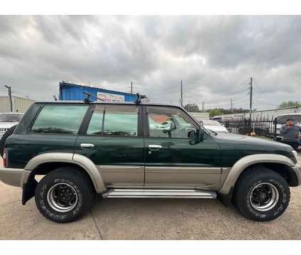 1998 Nissan Safari for sale is a Green 1998 Car for Sale in Houston TX