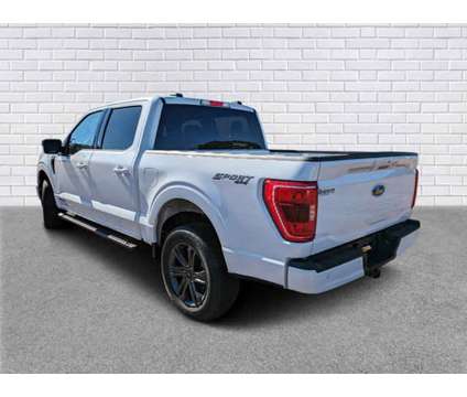 2023 Ford F-150 XLT is a White 2023 Ford F-150 XLT Car for Sale in Collins MS