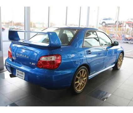 2004 Subaru Impreza WRX STi WRX STi is a Blue 2004 Subaru Impreza WRX STi Sedan in Lansing MI