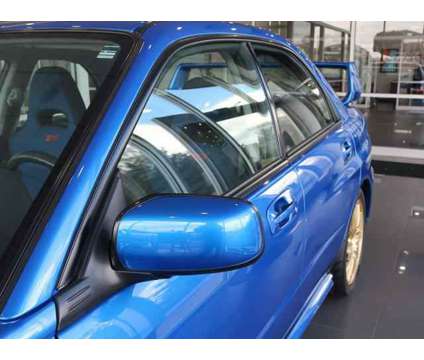 2004 Subaru Impreza WRX STi WRX STi is a Blue 2004 Subaru Impreza WRX STi Sedan in Lansing MI