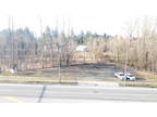 17,500 sf lot with 285' Fraser Hwy frontage