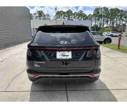 2024 Hyundai Tucson SEL is a Black 2024 Hyundai Tucson SE SUV in Gainesville FL