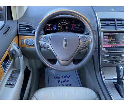 2014 Lincoln MKX is a Red 2014 Lincoln MKX Car for Sale in Cleveland GA