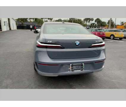2024 BMW i7 xDrive60 is a Gold 2024 Sedan in Jacksonville FL