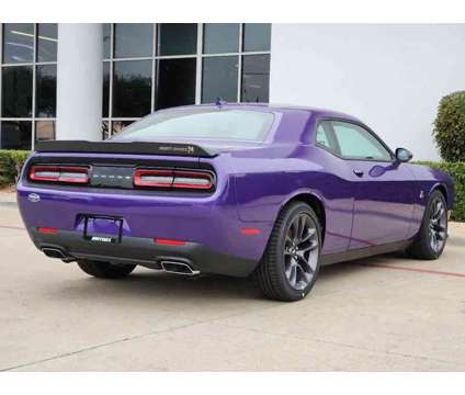 2023NewDodgeNewChallengerNewRWD is a Purple 2023 Dodge Challenger R/T Scat Pack Coupe in Lewisville TX