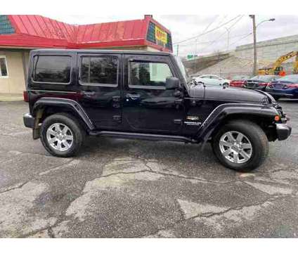 2012 Jeep Wrangler for sale is a Black 2012 Jeep Wrangler Car for Sale in Akron OH