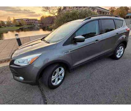 2014 Ford Escape for sale is a Grey 2014 Ford Escape Car for Sale in Sterling VA