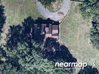 Foreclosure Property: NE Doniphan Ln