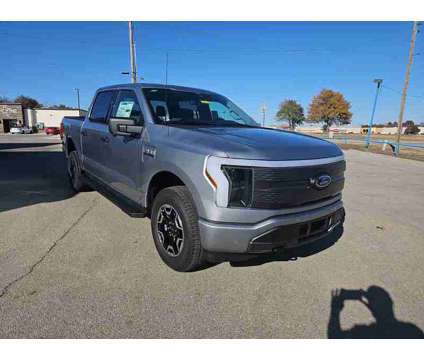 2023NewFordNewF-150 LightningNew4WD SuperCrew 5.5 Box is a Silver 2023 Ford F-150 Car for Sale in Bartlesville OK