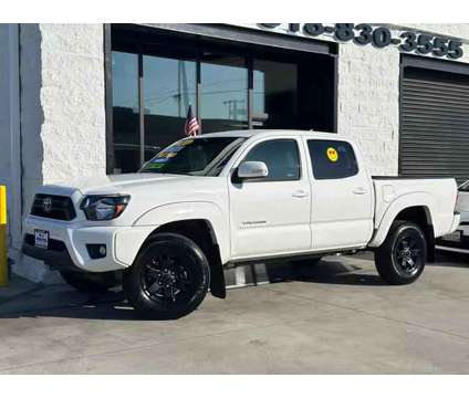 2014 Toyota Tacoma Double Cab for sale is a White 2014 Toyota Tacoma Double Cab Car for Sale in Pacoima CA