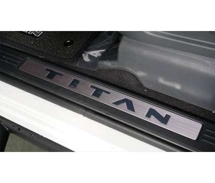 2024 Nissan Titan Crew Cab SV 4x2 is a White 2024 Nissan Titan Crew Cab Truck in Orlando FL