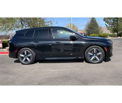 2022 BMW iX xDrive50 is a Black 2022 BMW 325 Model iX Car for Sale in Reno NV