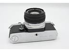 Olympus OM-1 Chrome + 50mm f/1.8 camera kit - Very Good