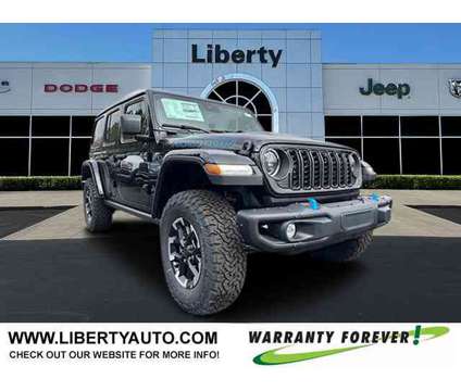 2024 Jeep Wrangler 4xe Rubicon X is a Black 2024 Jeep Wrangler Car for Sale in Pataskala OH