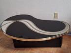 Uniquely shaped Coffee table $395