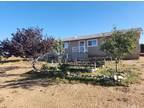 8471 Caughlin Rd, Phelan, CA 92371