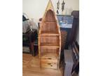 Wooden canoe shelf