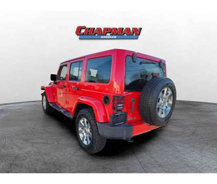 2017 Jeep Wrangler Unlimited Sahara is a Red 2017 Jeep Wrangler Unlimited Sahara Car for Sale in Horsham PA