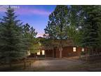 581 Whispering Winds Dr, Woodland Park, CO 80863