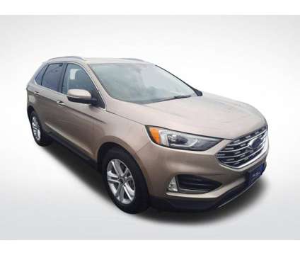 2020 Ford Edge SEL is a Gold 2020 Ford Edge SEL Car for Sale in Plymouth WI