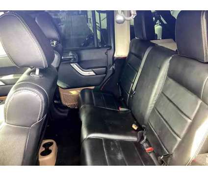 2012 Jeep Wrangler for sale is a Black 2012 Jeep Wrangler Car for Sale in Houston TX