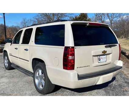 2013 Chevrolet Suburban 1500 for sale is a White 2013 Chevrolet Suburban 1500 Trim Car for Sale in Springfield MO
