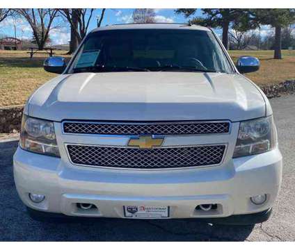 2013 Chevrolet Suburban 1500 for sale is a White 2013 Chevrolet Suburban 1500 Trim Car for Sale in Springfield MO