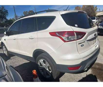 2014 Ford Escape for sale is a White 2014 Ford Escape Car for Sale in Houston TX