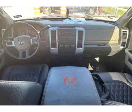 2009 Dodge Ram 1500 Crew Cab for sale is a Orange 2009 Dodge Ram 1500 Car for Sale in Houston TX