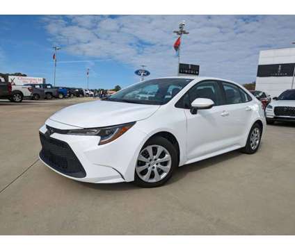 2021 Toyota Corolla LE is a White 2021 Toyota Corolla LE Car for Sale in Collins MS