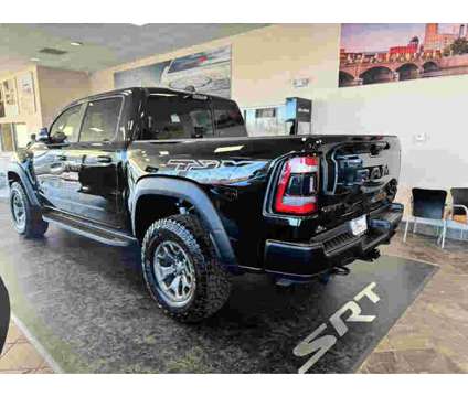 2024NewRamNew1500New4x4 Crew Cab 57 Box is a Black 2024 RAM 1500 Model Car for Sale in Greenwood IN