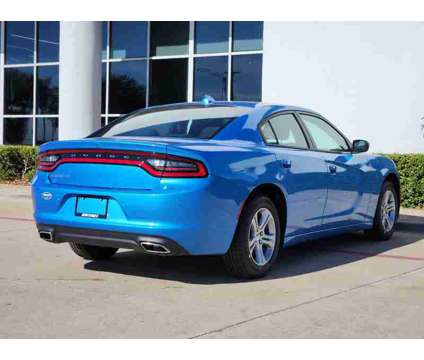 2023NewDodgeNewChargerNewRWD is a Blue 2023 Dodge Charger SXT Sedan in Lewisville TX