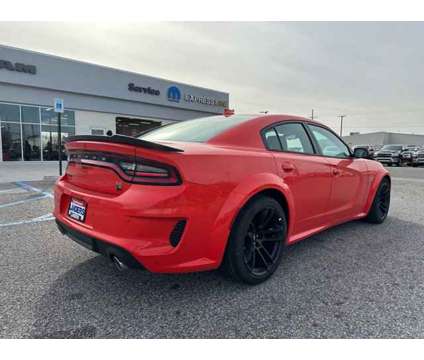2023 Dodge Charger Scat Pack Widebody is a Gold 2023 Dodge Charger Car for Sale in Southaven MS