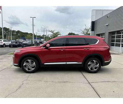 2023 Hyundai Santa Fe SEL is a Red 2023 Hyundai Santa Fe SE SUV in Gainesville FL