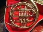 Holton H600 French Horn with mouthpiece and black hard case - shows wear, dents